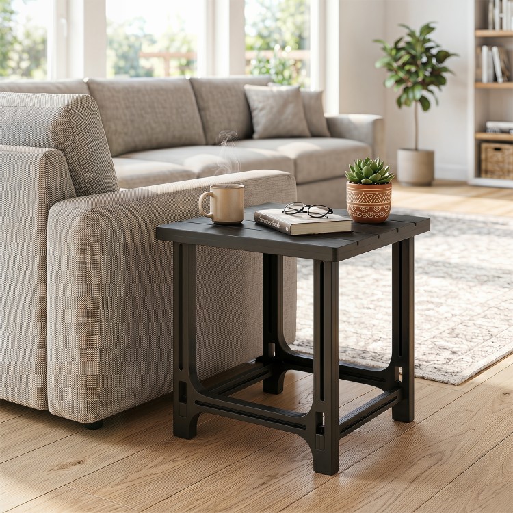 Black Adirondack side table with slatted surface, perfect for outdoor use, featuring a sturdy frame and waterproof material.