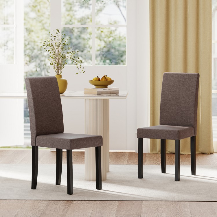 Set of 2 brown mid-century modern dining chairs with rubber wood frame and thick cushioned seats for comfort.