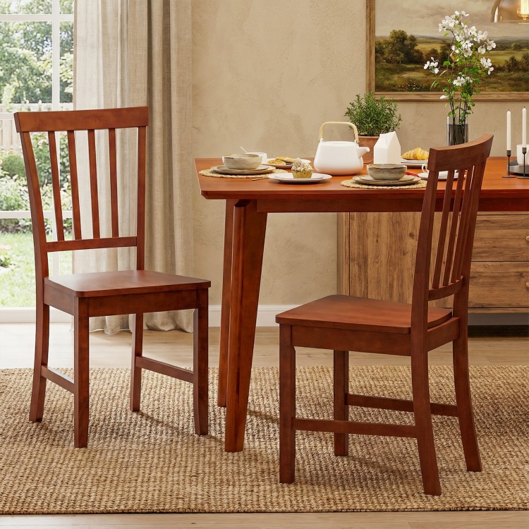 Set of 2 dining chairs with solid rubber wood legs, elegantly designed for kitchen or dining room use.
