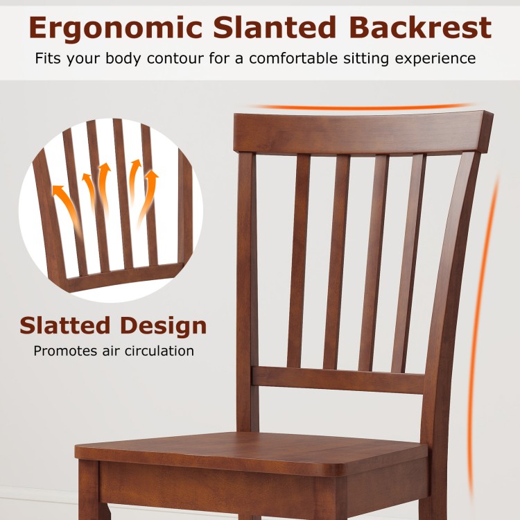 Ergonomic slanted backrest of a wooden dining chair, featuring solid rubber wood legs for comfort and support.