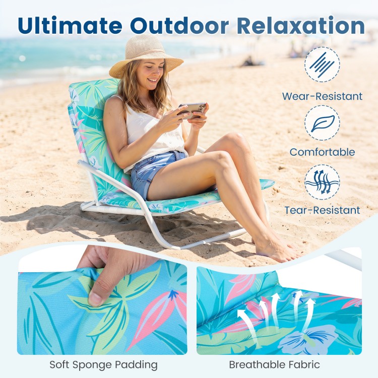 Folding beach chair with soft sponge padding and breathable fabric, perfect for camping and outdoor relaxation.