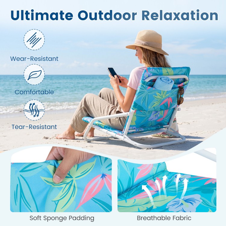 Folding beach chair with soft sponge padding and breathable fabric, ideal for camping and outdoor relaxation.