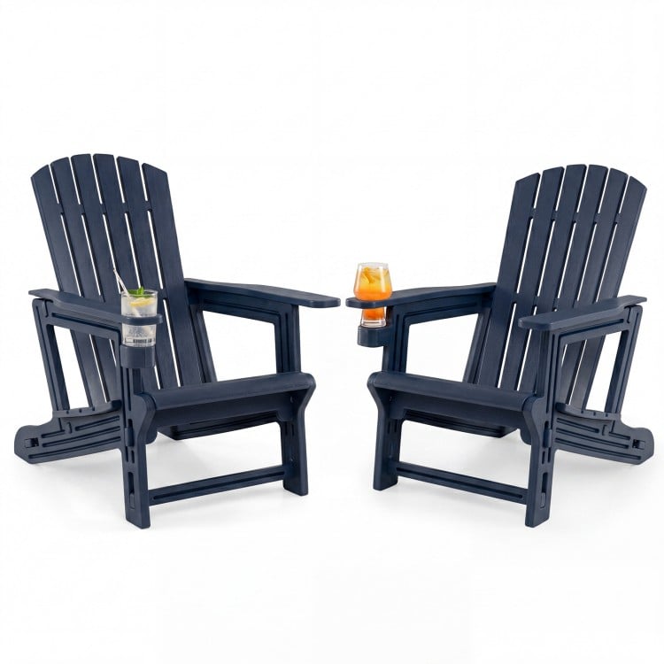 Two HDPE Adirondack chairs with cup holders feature a wood-like texture, ideal for outdoor relaxation by the fire pit.