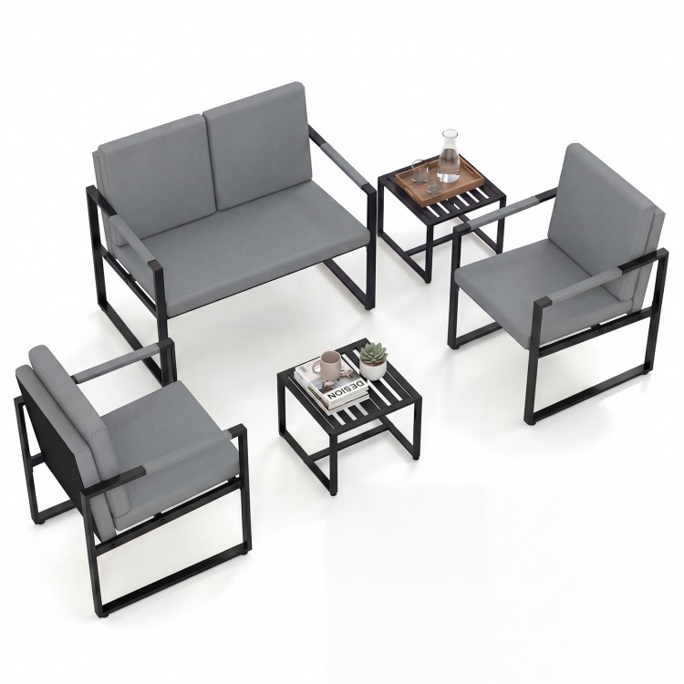 Mid Century Modern single sofa chairs with gray cushions, featuring sturdy metal frames, ideal for living rooms or.