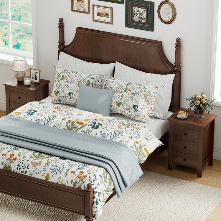 Walnut nightstand with three drawers, featuring a stylish design and ample storage for various room settings.
