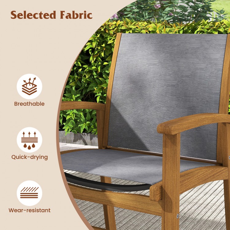Close-up of a patio dining chair featuring breathable fabric and a sturdy acacia wood frame, perfect for outdoor.