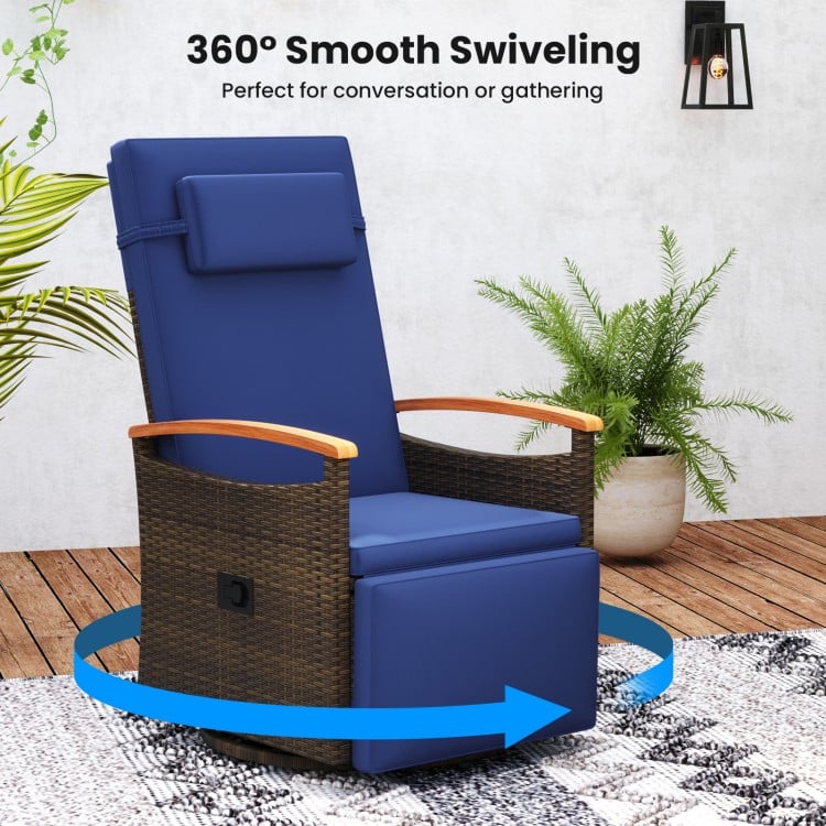 Navy patio rattan 360° swivel recliner chair with adjustable backrest and footrest, ideal for outdoor relaxation.