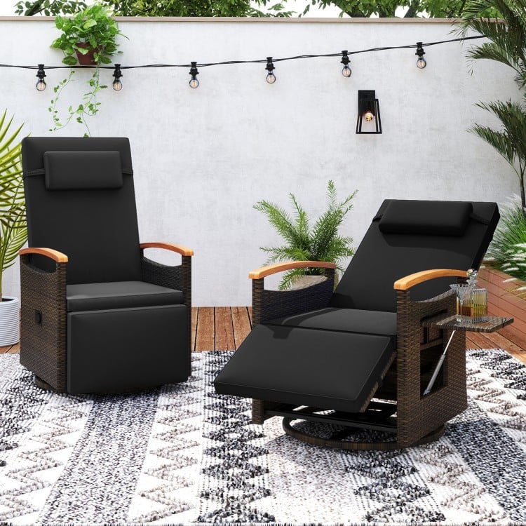 Set of 2 black patio rattan swivel recliner chairs with adjustable backrests, perfect for backyard relaxation.