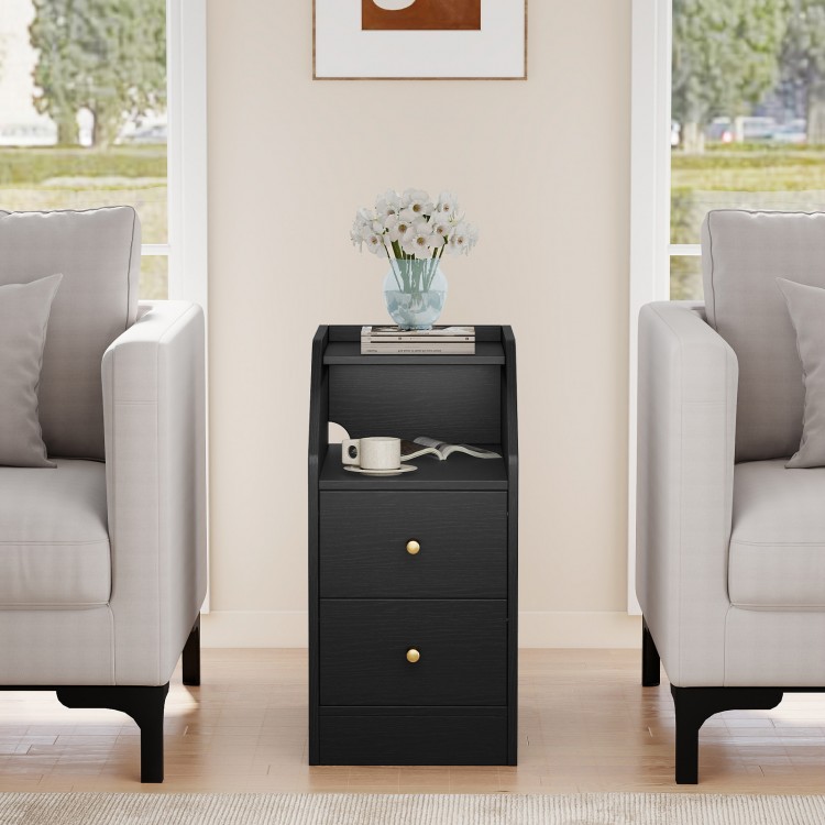 Black side end table with charging station, two drawers, and open compartment for organized storage beside a sofa.