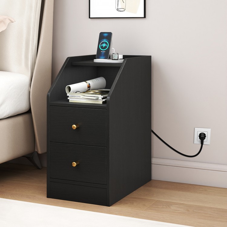 Black side end table with charging station, two drawers, and shelf for organized storage beside a sofa or bed.