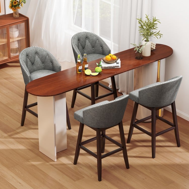 Set of 2 gray swivel bar stools with rubber wood legs, featuring padded backrests and stylish rivets for kitchen or pub.