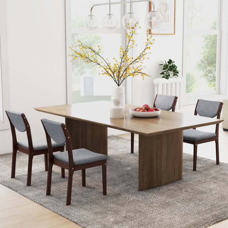Set of 2 gray wood kitchen chairs with faux leather seats, featuring ergonomic backrests for dining room comfort.