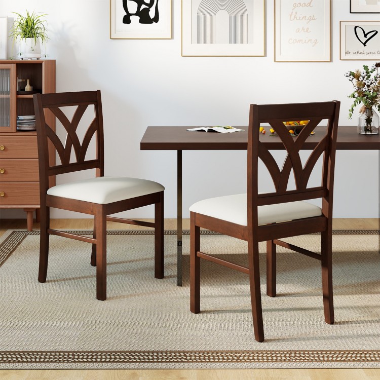 Set of 2 brown wooden dining chairs with hollowed backrest and soft padded seat, perfect for kitchen or dining room.