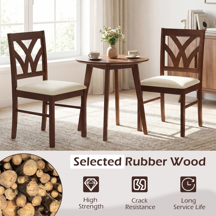 Set of 2 brown wooden dining chairs with upholstered padded seats and hollowed backrest for kitchen or dining room use.