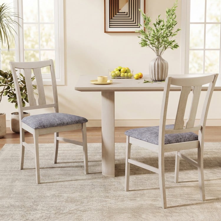 Set of 2 gray upholstered dining chairs with high curved backs, featuring a durable rubber wood frame for timeless.