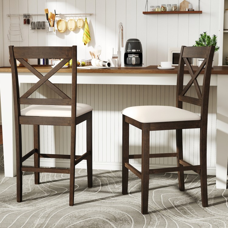 Set of 2 brown X-back bar stools with upholstered cushioned seats, perfect for kitchen islands or home bars.