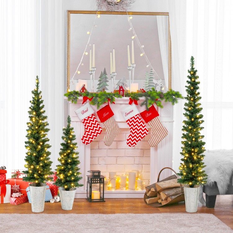 Set of 3 pre-lit artificial Christmas trees with warm white LED lights, perfect for festive home decoration.