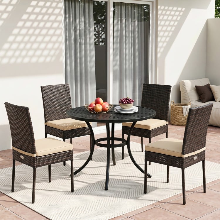 Set of 4 brown patio dining chairs with soft, removable cushions, featuring durable PE rattan for outdoor use.