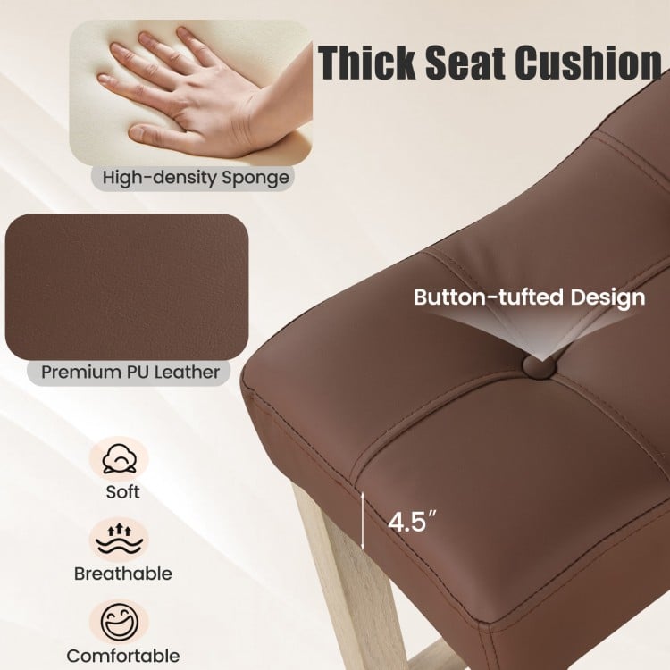 Thick 4.5" cushion of a brown upholstered bar stool with button-tufted design for comfort and style in any room.
