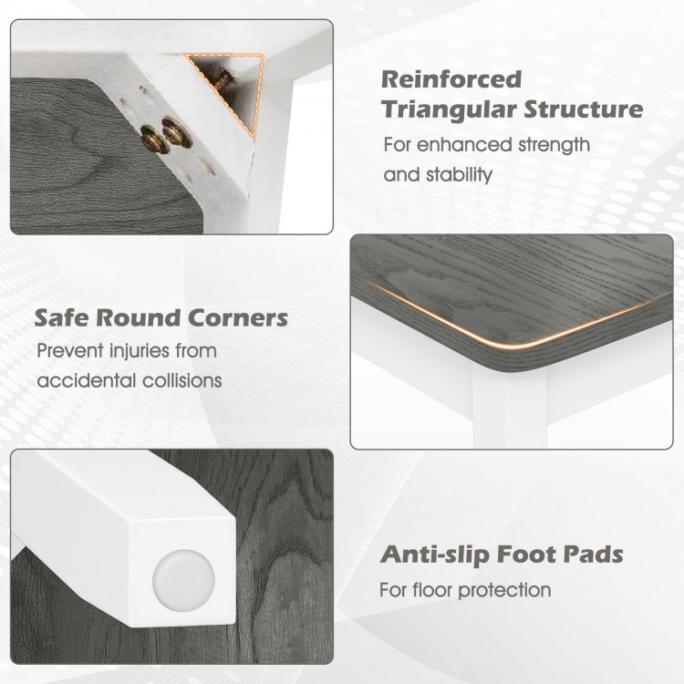 Detail of the anti-slip foot pads and reinforced structure of the set of 4 gray wood dining chairs for stability.