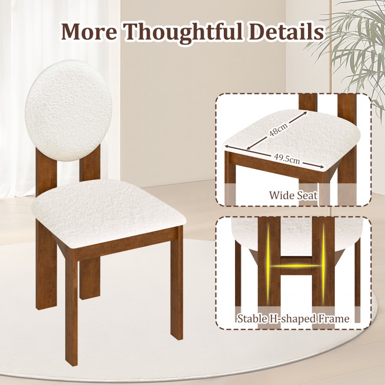 Sherpa dining chair with rubber wood legs, featuring a wide seat and round backrest for comfort and stability in any.