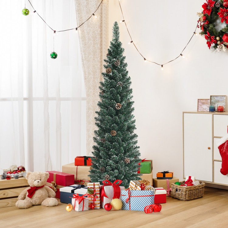 Snowy 5 ft artificial pencil Christmas tree with pine cones, surrounded by festive gifts for holiday decoration.