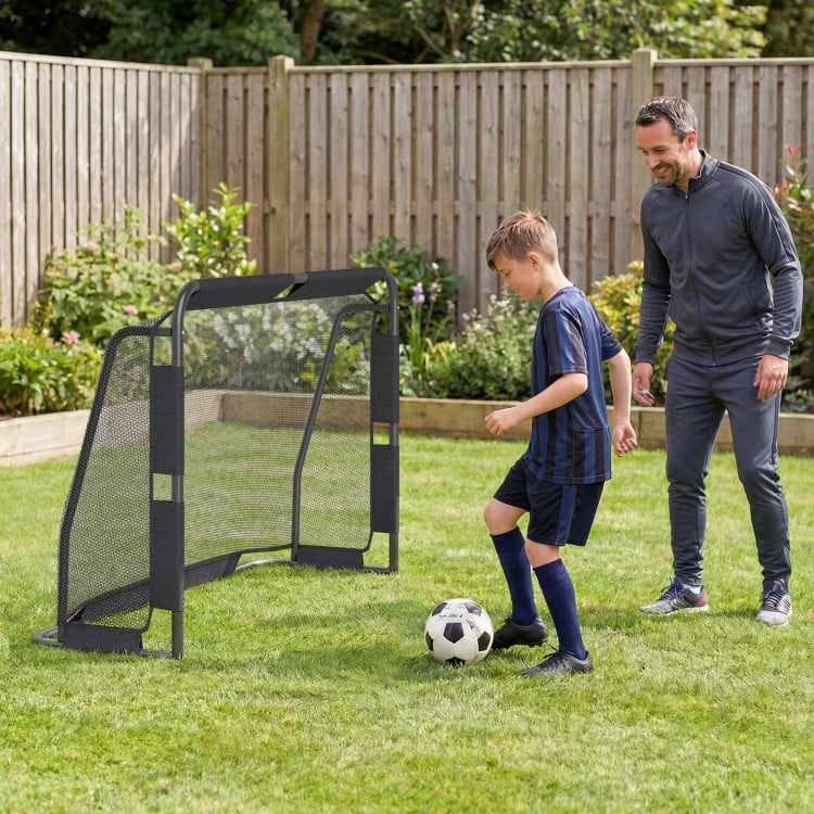 Backyard soccer goal set with a 6 ft x 4 ft metal frame, featuring a durable net and anchoring system for stability.
