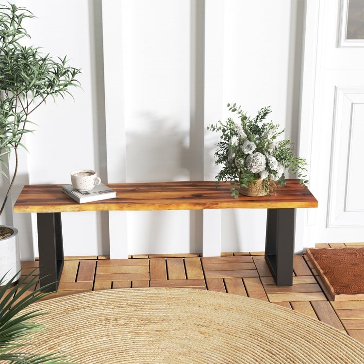 Solid acacia wood patio bench with metal legs, featuring a polished surface, ideal for contemporary outdoor seating.