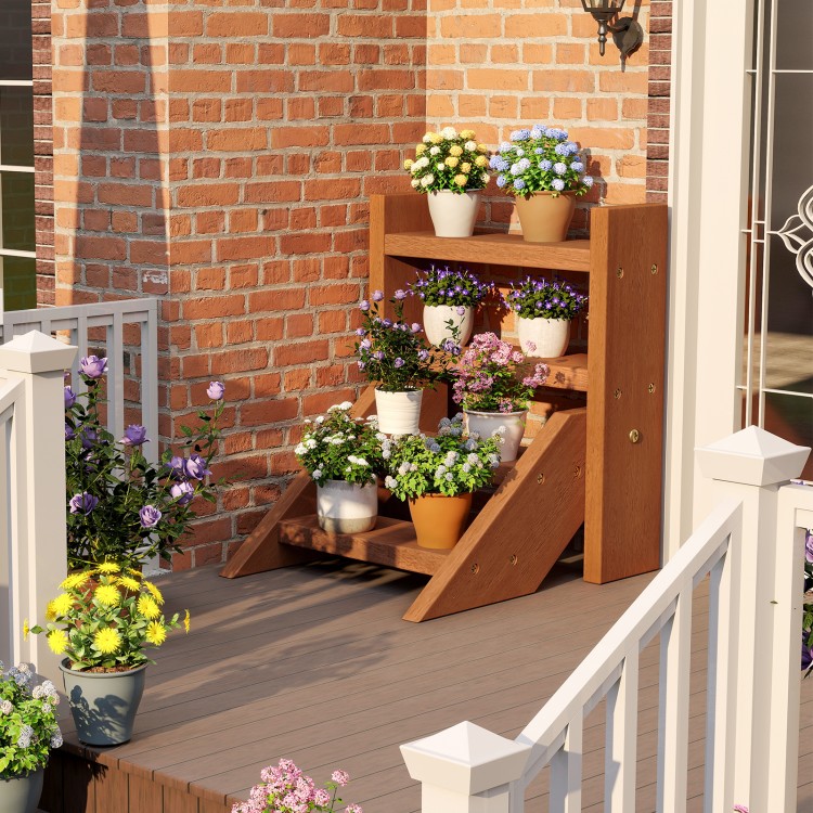 Solid wood plant stand with four tiers, showcasing potted flowers, perfect for porches or balconies.