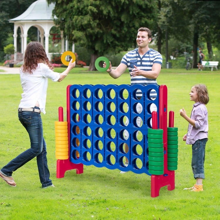 Jumbo 4-to-Score Giant Game Set with colorful rings, perfect for outdoor parties and improving children's motor skills.