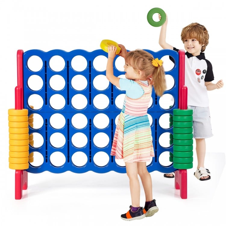 Children playing with the Jumbo 4-to-Score Giant Game Set, featuring colorful rings for outdoor fun and skill.