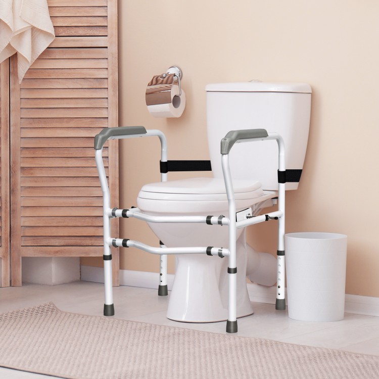 Steel safety toilet rail with adjustable height and width, designed for stability and support for elderly users.
