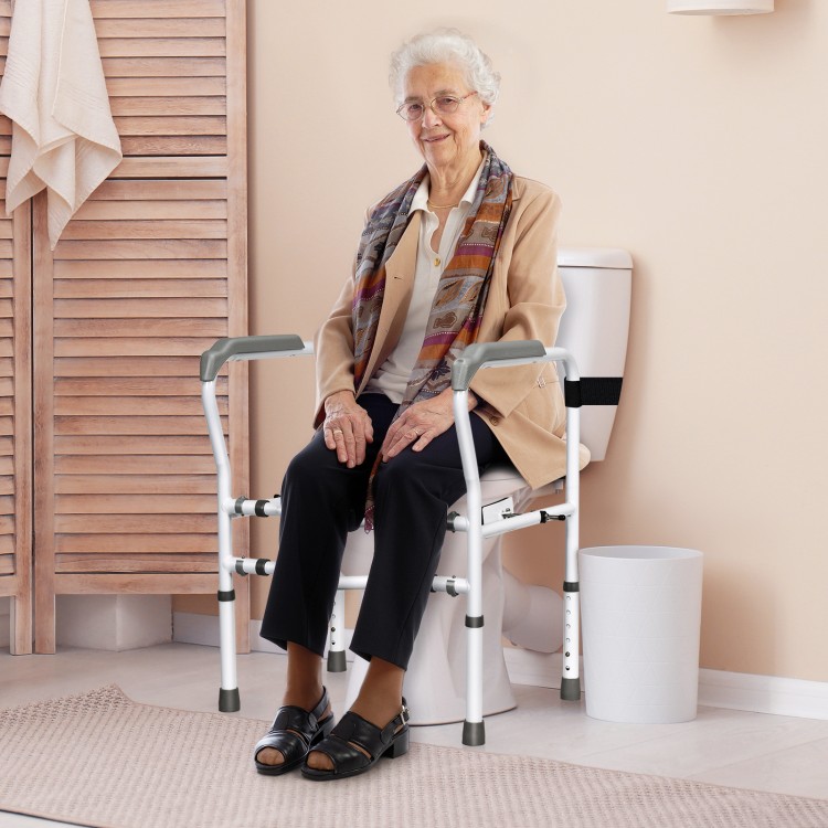 Steel safety toilet rail with adjustable height, sturdy frame, and soft armrests for elderly and disabled support.