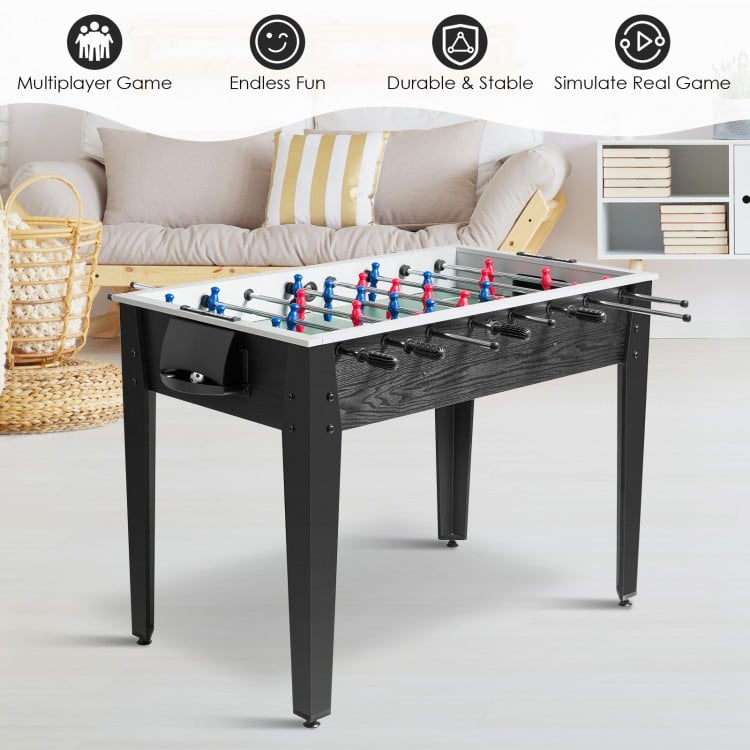 48-inch black wooden foosball table with ergonomic handles, ideal for home or game room entertainment.