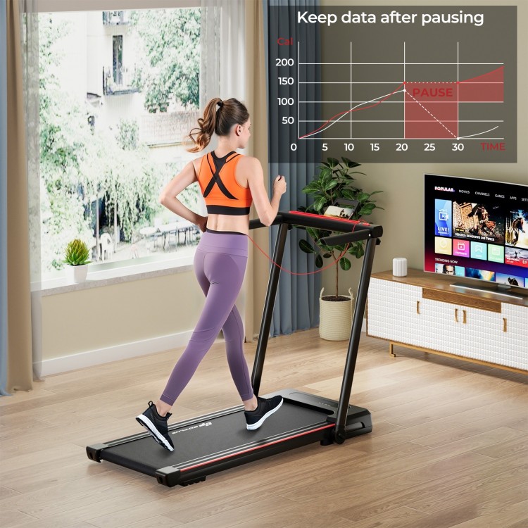 Folding treadmill with large desk and LCD display, featuring a spacious running belt for comfortable workouts.