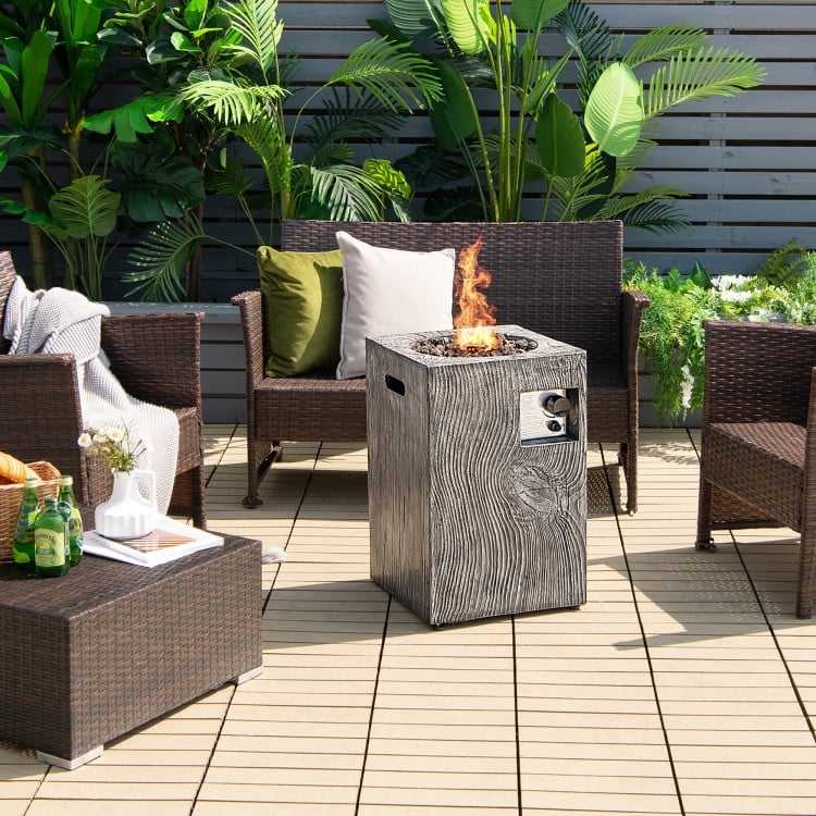 Square outdoor propane fire pit with lava rocks, featuring a waterproof cover and antique finish, perfect for patio.