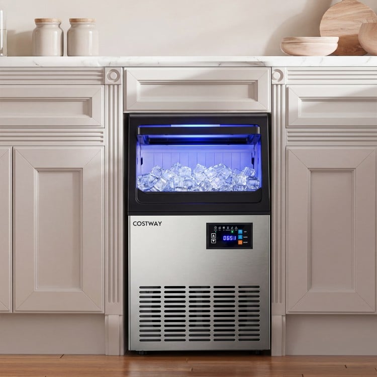 Stainless steel ice maker with blue interior lights, 30 lbs storage, and 80 lbs daily output for home or under counter.