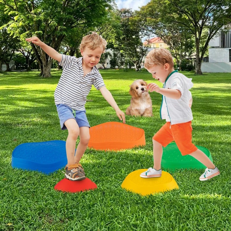 Colorful non-slip balance stones for kids, promoting coordination and play, suitable for indoor or outdoor use.