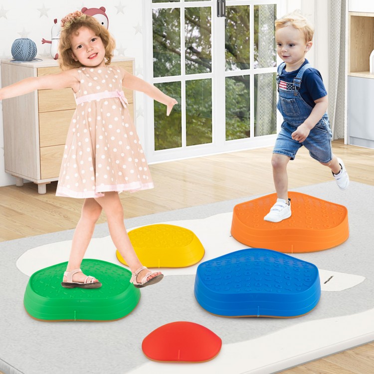 Two children play on colorful non-slip balance stones, enhancing coordination and balance skills in an indoor setting.