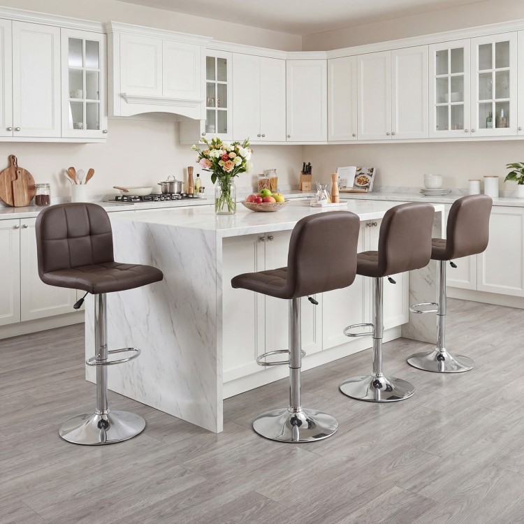 Set of two brown swivel bar stools with adjustable height and metal bases, perfect for kitchen or dining areas.