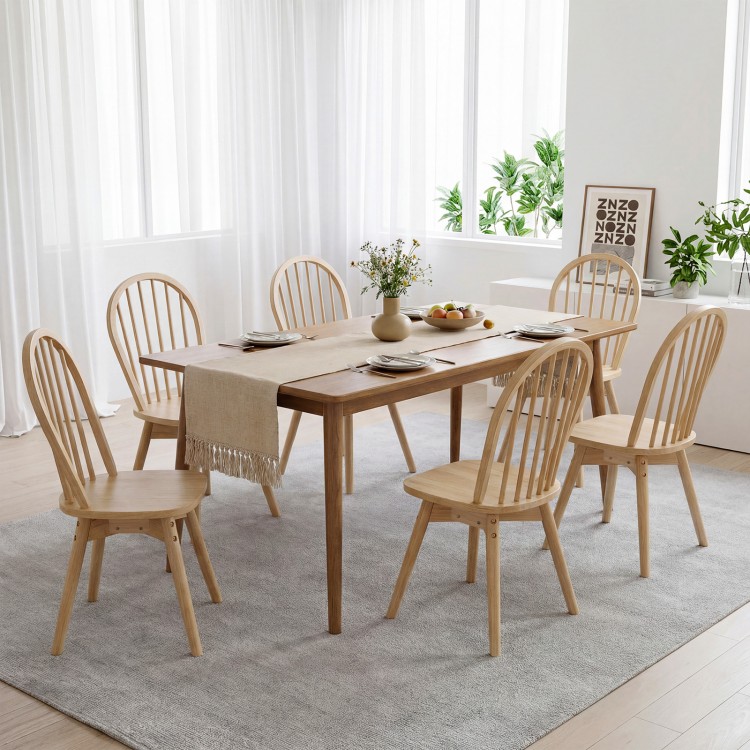 Set of four Swivel Windsor dining chairs with solid rubber wood frame, featuring a natural finish for farmhouse.