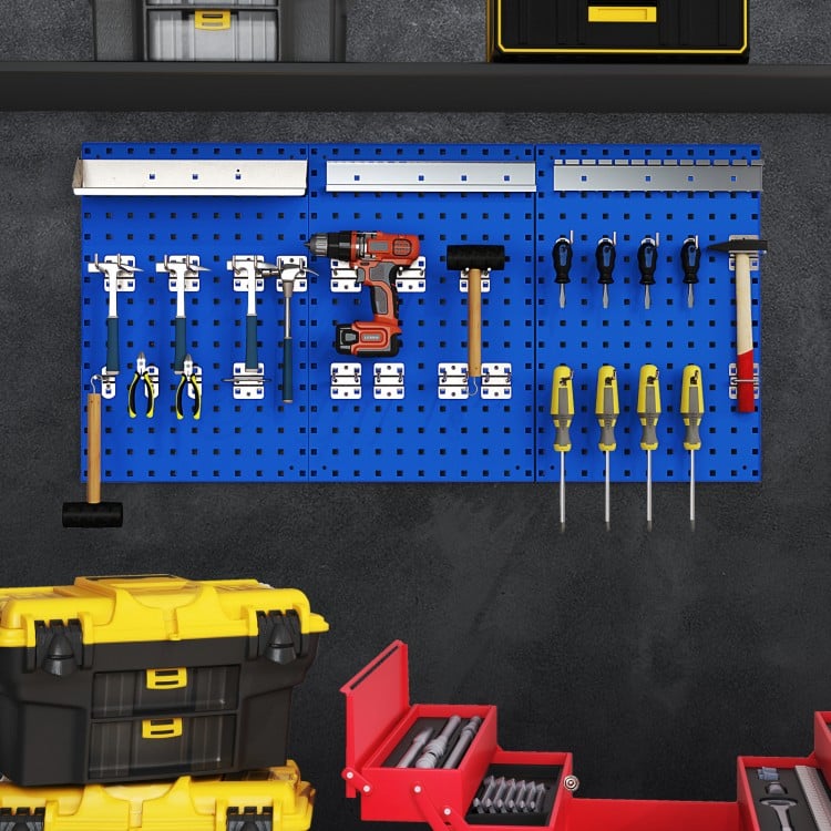 Wall-mounted pegboard kit in navy with tools organized, featuring 3 pegboards and 28 assorted hanging accessories for.