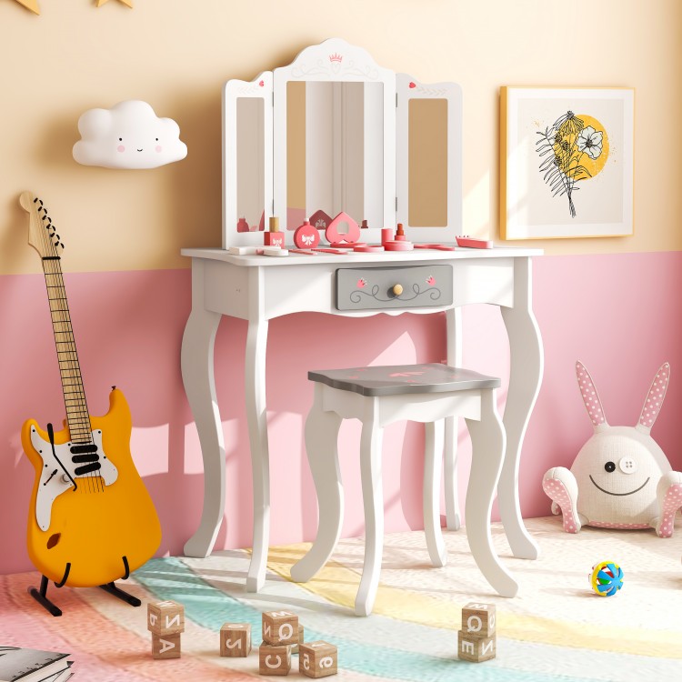 Kids vanity set in white showcasing a removable mirror and elegant curved legs, perfect for imaginative play in a.