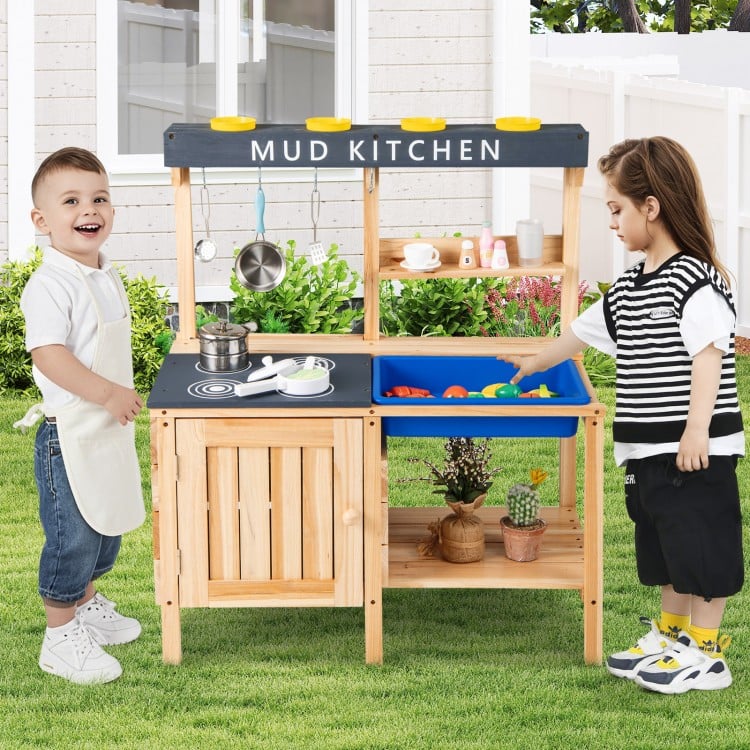 Wooden outdoor mud kitchen playset for kids with kitchenware, featuring shelves and hooks for imaginative play.