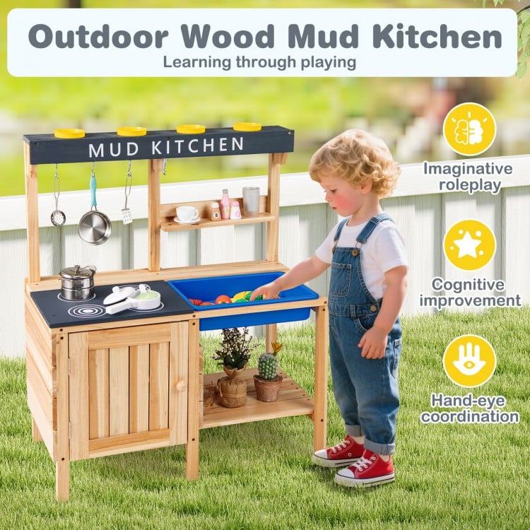 Wooden outdoor mud kitchen playset with stove, shelves, and kitchenware for imaginative play and skill development.