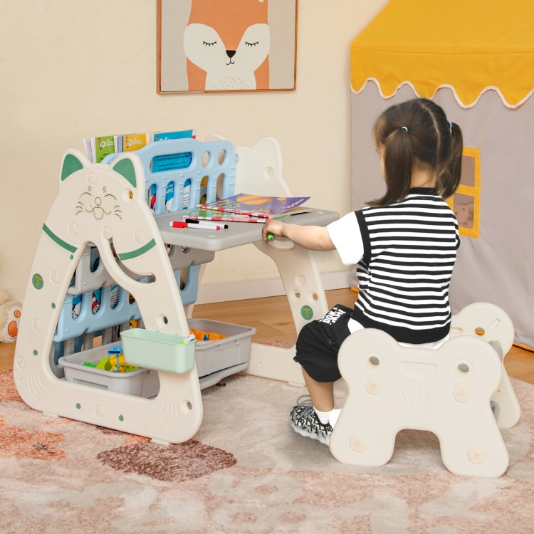 Child using the 3-in-1 double-sided magnetic dry-erase board with stool, featuring a book rack and art easel for.