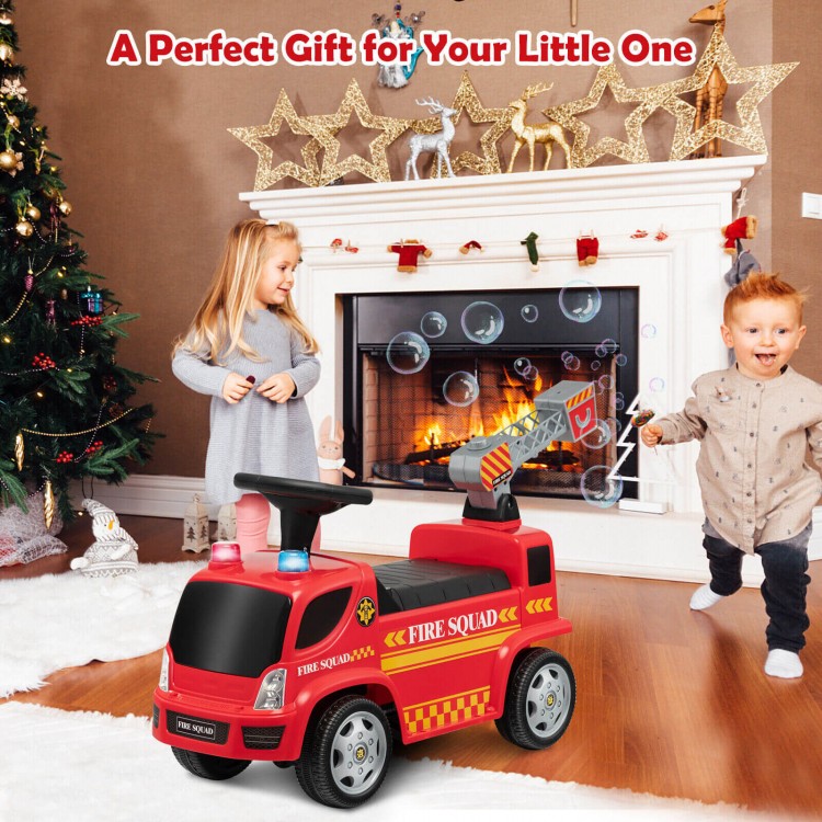 Kids push ride-on fire truck in red with ladder and bubble maker, ideal for toddlers aged 18-36 months for indoor fun.