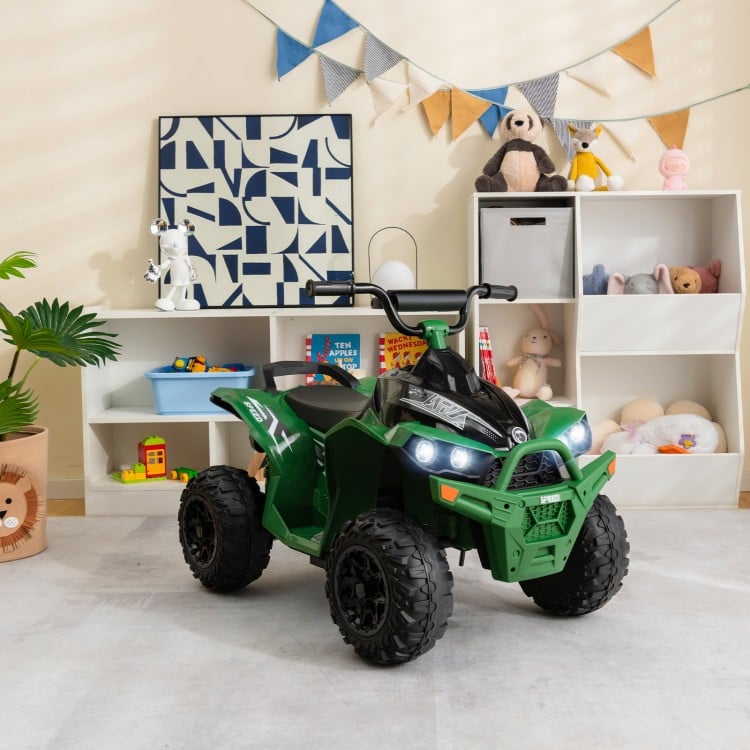Kids ride-on ATV in army green with bright headlights, comfortable seat, and anti-slip wheels for safe outdoor fun.