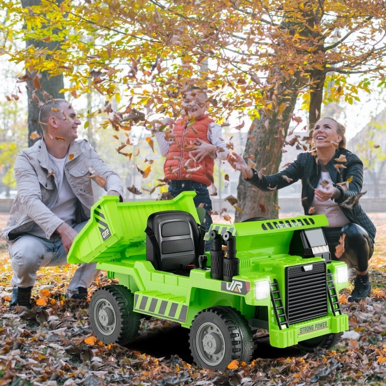 Kids ride-on dump truck in green with electric dump bed, perfect for outdoor fun and toy storage.