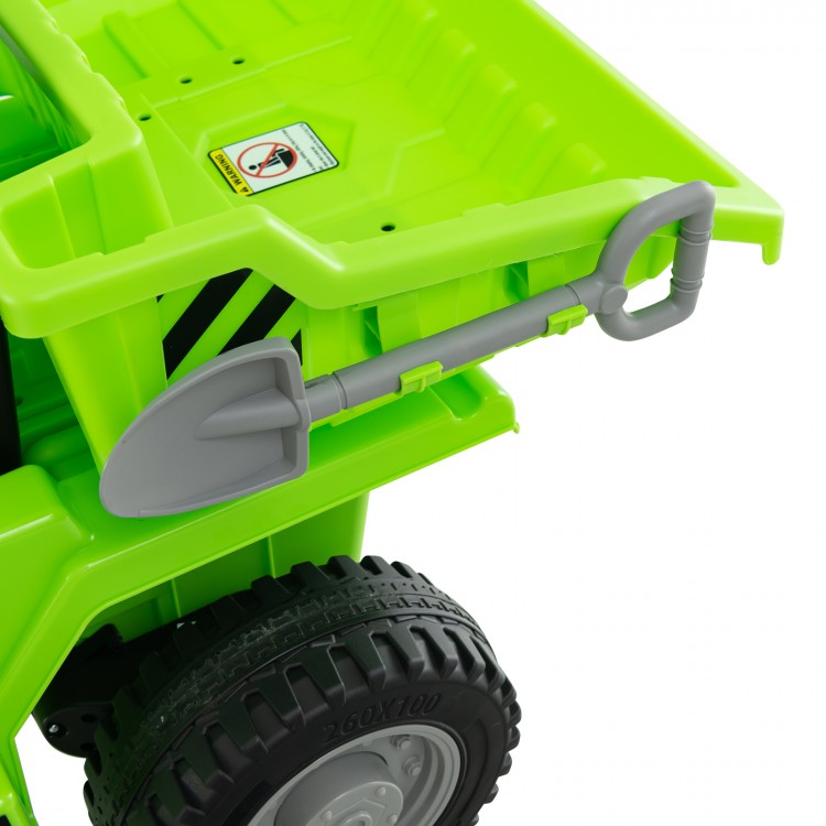 Green kids ride-on dump truck featuring a toy shovel attached to the side, designed for fun and safe outdoor play.